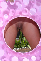 Layla Rose will hynotize you with her huge breasts by the pool