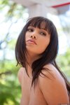 Lana Lopez takes off her grey top