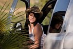 Megan Piper takes her top off in the back of a pickup truck