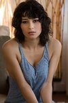 Raven Rockette pulls off her soft top and jeans