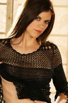 Natalia Wood is a long-haired natural brunette with a lovely tall body