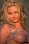 Andrea Mountjoy rides on a bike