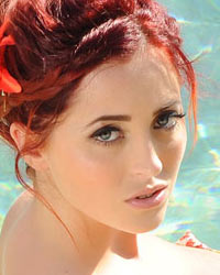 Lucy V Strips From Her Floral Bikini In the Pool
