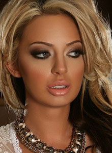 Alluring Vixens: Alluring Vixen Alexandra teases with her big breasts in a tight white lace outfit
