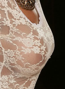 Alluring Vixens: Alluring Vixen Alexandra teases with her big breasts in a tight white lace outfit