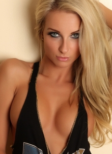 Alluring Vixens: Busty Alluring Vixen babe Aneta teases in a skimpy tank that barely covers her perfect breasts