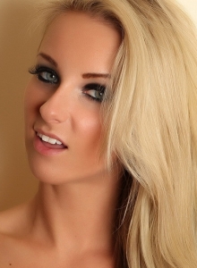 Alluring Vixens: Perfect blonde vixen Aneta shows off her tight body as she strips out of her semi sheer tube top
