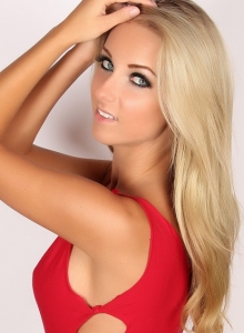 Alluring Vixens: Stunning blonde Alluring Vixen babe Aneta teases in a skimpy tight little red dress