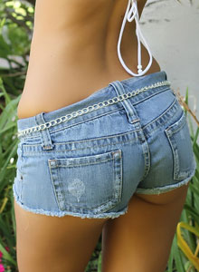 Alluring Vixens: Tanned vixen Ashley is in the backyard in a tiny bikini top and short jean cutoffs