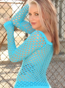 Alluring Vixens: Electrifying Alluring Vixens babe Steph shows off her perfect curves in a blue mesh top and matching booty shorts