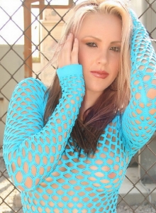 Alluring Vixens: Electrifying Alluring Vixens babe Steph shows off her perfect curves in a blue mesh top and matching booty shorts