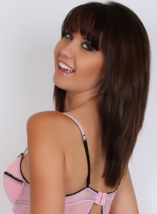 Alluring Vixens: Sexy vixen Chrissy Marie teases in a classic looking pink lingerie outfit with no panties on