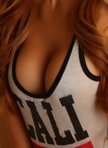 Alluring Vixens: Sexy exotic Alluring Vixens babe Jannie shows off her perfect body in her skimpy tank top and very short shorts