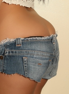 Alluring Vixens: Stunning Alluring Vixen babe Karla teases in her skimpy white crochet vest and tiny jean cutoffs