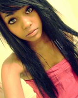 Neat mulatto cutie posing in hot pictures