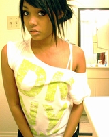 Neat mulatto cutie posing in hot pictures