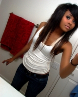 Neat mulatto cutie posing in hot pictures