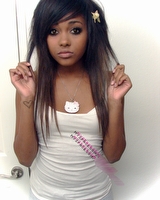 Neat mulatto cutie posing in hot pictures