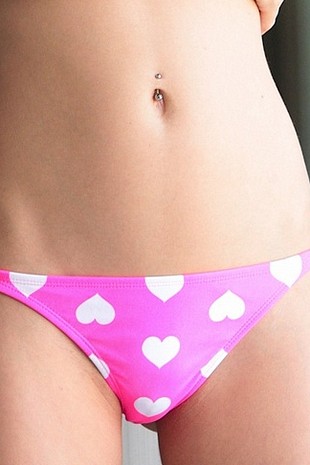 Cute teen Catie Minx looking hot in a polka dot bikini