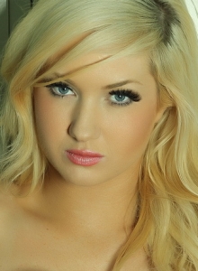 I Luv Ashlie: Blonde babe Ashlie is the perfect knockout as she poses topless in a black little thong