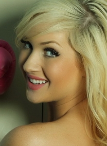 I Luv Ashlie: Blonde babe Ashlie is the perfect knockout as she poses topless in a black little thong