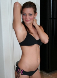 I Want Katie: Busty teen Katie takes off her bra and pulls her panties aside to show her tight pussy to the camera