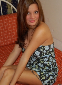 I Want Katie: Busty babe Katie shows off her huge tits as she strips out of her sexy flower covered dress