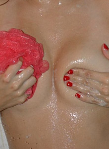 Jana Rocks: Cute blonde teen Jana starts out in the shower in her bikini and finishes completely naked and wet