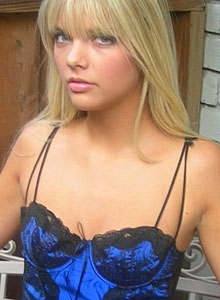 Jana Rocks: Blonde babe Jana Rocks is outside on the patio in sexy blue and black lingerie