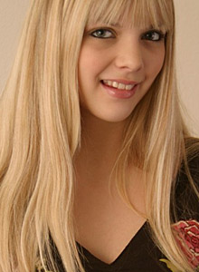 Jana Rocks: Sexy blonde teen Jana strips down to her tiny g-string before getting into bed