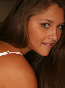 Lili Jensen: Tanned beauties Lili Jensen and Cali Logan play around in bed wearing sexy white lingerie