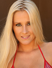 Mandi is on fire in her teeny tiny, shiny red bikini