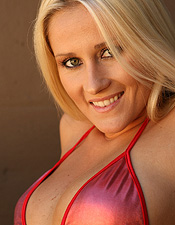 Mandi is on fire in her teeny tiny, shiny red bikini