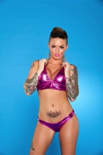 Christy has some fun showing of her Purple Bikini