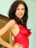 Nubiles.net Iraina - Horny Nubile Iraina takes off her sexy red undies and posing her naked body on top of the table