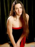 Nubiles.net Petra - Seductive fresh teenie posing topless as she takes of her red bra