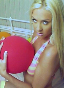 Ashleys Candy: Ashley likes with her perky tits as she strips out of her little outfit surrounded by balloons