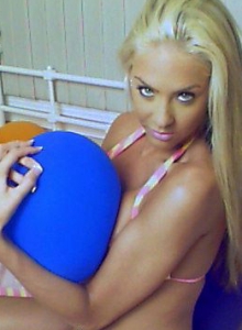 Ashleys Candy: Ashley likes with her perky tits as she strips out of her little outfit surrounded by balloons