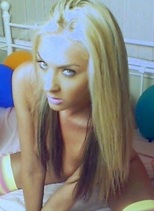 Ashleys Candy: Ashley likes with her perky tits as she strips out of her little outfit surrounded by balloons