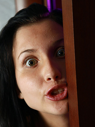 Sexy teen making funny facing being naked