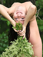 Horny and daring brunette Selma with huge tattoo on her back is having fun outdoors