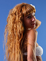Entrancing Nancy has got gorgeous long hair and seductive body