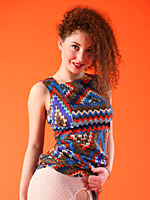 Daisy in zigzag dress and torn fishnet stockings with her cunt exposed