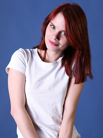 Redhead girl Gerda shows nice shapes of her tall slender body