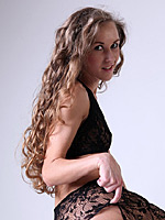 Blonde nympho Larisa looks overwhelming in her black fancy lingerie