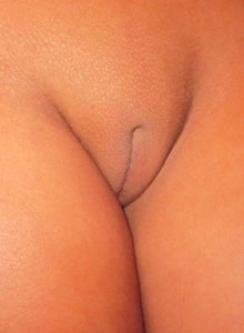 Craving Carmen Nude: Craving Carmen shows off her perfect pussy as she takes candid pictures in a skimpy string bikini