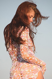 Tall slim brunette teen getting nude in the sunrise rays