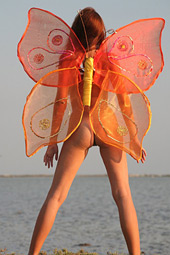 Hot stunning girl posing naked with butterfly wings