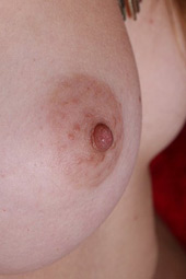 Blonde petite teen girl with perfect tits posing nude