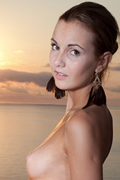 Tall perfectly shaped teen standing naked on the balcony of the hotel